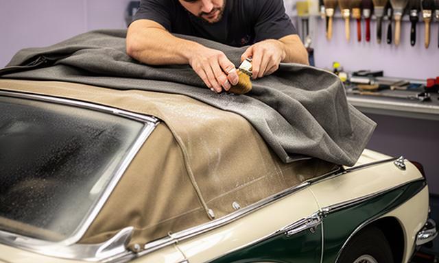 Soft-top convertible receiving careful canvas cleaning and waterproofing in a specialist London studio
